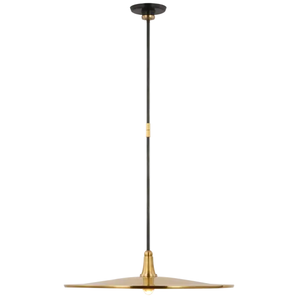 The Truesdell pendant combines hand-rubbed antique brass and bronze finishes in a substantial 24-inch design. Its transitional style bridges traditional warmth with industrial edge, making it versatile for both residential and commercial spaces.