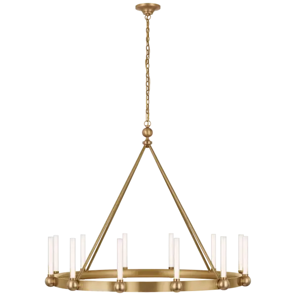 The Jeffery XL Ring Chandelier commands attention with its oversized circular silhouette and hand-rubbed antique brass finish. White glass shades soften the bold geometric form, creating a perfect balance of drama and elegance for grand spaces.