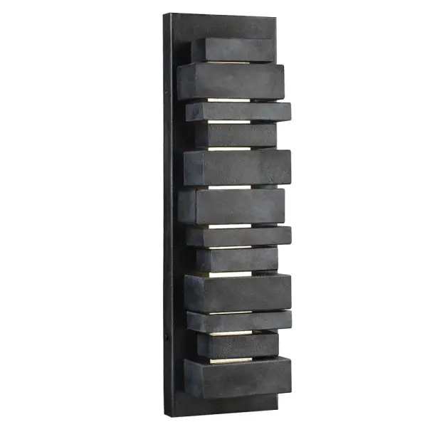 The Ledgend outdoor wall sconce makes a bold architectural statement with its stacked flagstone-inspired design. Energy-efficient integrated LEDs shine through offset openings while casting light up and down for dramatic effect.