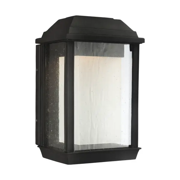 The McHenry LED wall sconce combines energy efficiency with exceptional durability through StoneStrong construction. Its warm-on-dim technology and wet-rated design make it ideal for coastal outdoor applications.