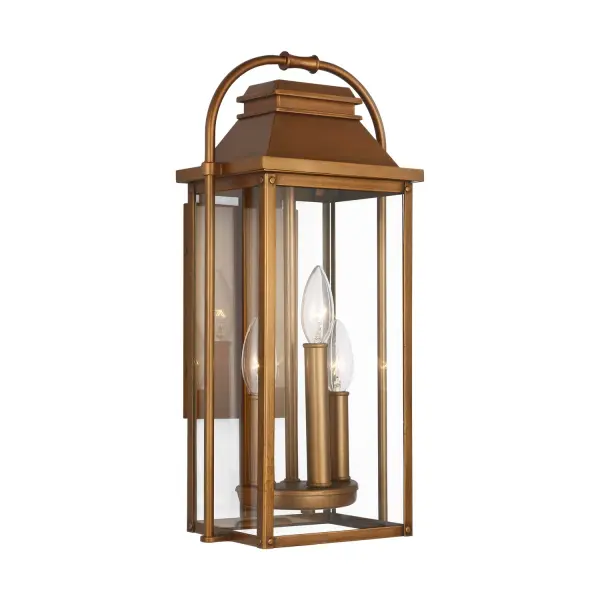 The Wellsworth wall lantern blends traditional design with coastal influences, featuring a natural copper finish and clear seeded glass. Its compact 8.5-inch width makes it ideal for smaller outdoor spaces while the wet-rated cast aluminum construction ensures long-lasting durability in any weather.