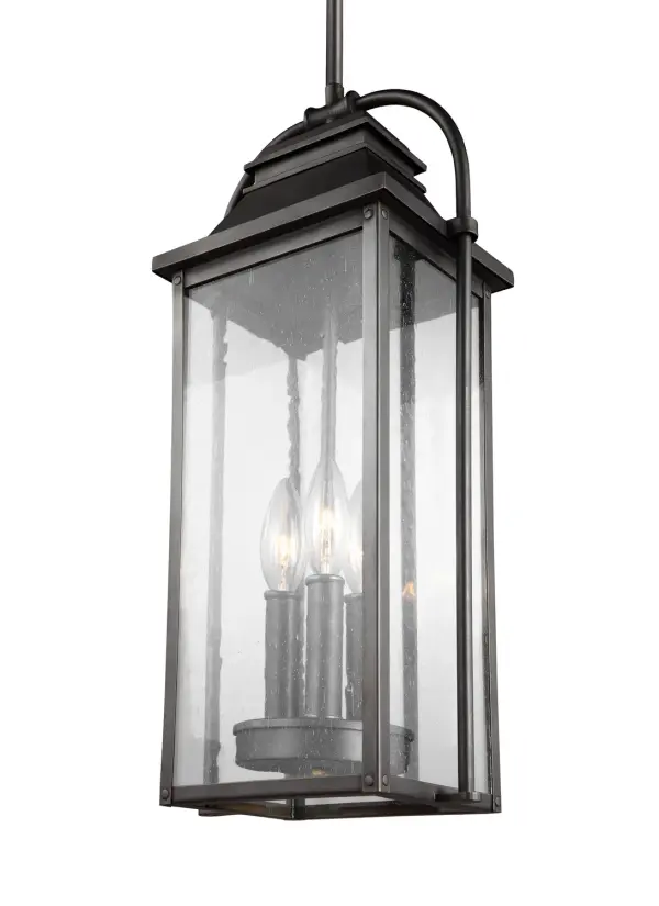 The Wellsworth pendant blends traditional lantern styling with subtle nautical influences, perfect for covered outdoor spaces. Cast aluminum construction and wet rating ensure long-lasting performance in harsh weather conditions.