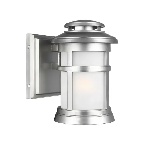 The Newport wall lantern combines nautical charm with exceptional durability. Its StoneStrong construction withstands coastal conditions while lighthouse-inspired details and etched glass create warm, welcoming illumination.