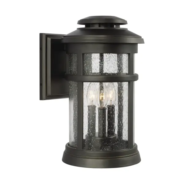 The Newport wall lantern combines nautical charm with practical durability. Its StoneStrong construction withstands harsh coastal conditions while the lighthouse-inspired vented top and detailed cast frame add authentic character.