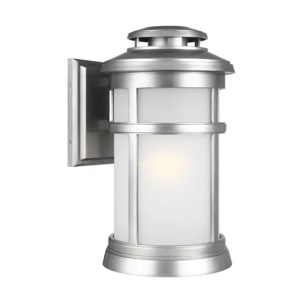 The Newport wall lantern combines nautical charm with practical durability. Its StoneStrong construction withstands harsh coastal conditions while the vented lighthouse design and etched glass create warm, welcoming illumination.