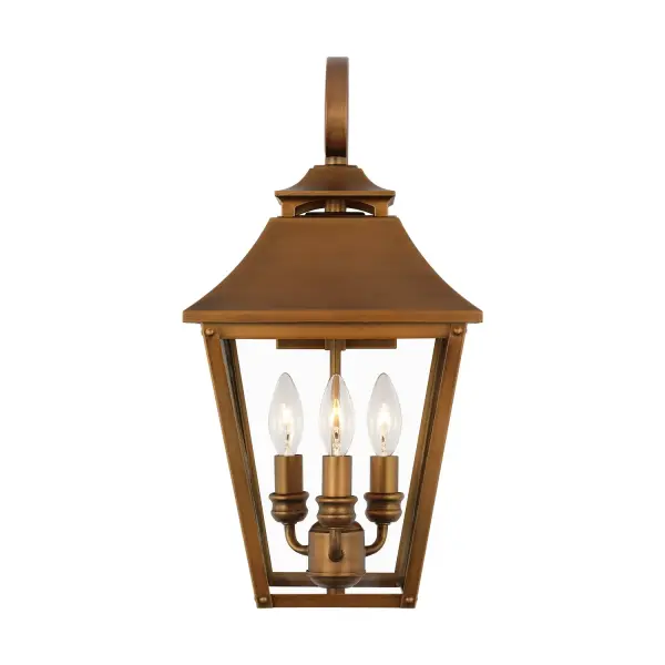 The Galena wall lantern by Sean Lavin brings timeless European elegance to outdoor spaces. Its natural copper finish develops a beautiful patina over time, while the tapered clear glass and candle-style tubes create warm, inviting illumination.