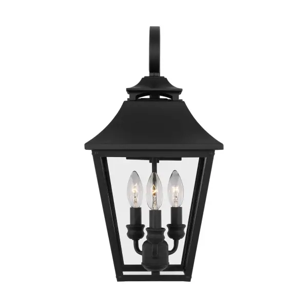 The Galena outdoor wall sconce brings timeless European charm with its tapered clear glass shades and curved hook detail. Wet-rated for durability, this three-light fixture offers warm, welcoming illumination for entryways and outdoor living spaces.