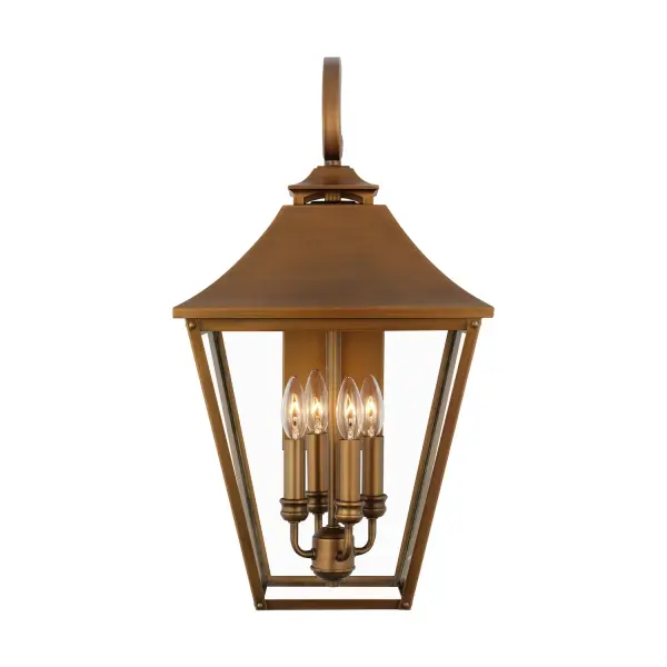 The Galena wall lantern by Sean Lavin brings timeless European elegance to outdoor spaces. Its natural copper finish develops a beautiful patina over time, while the clear glass shades and candle-style tubes create warm, welcoming illumination.
