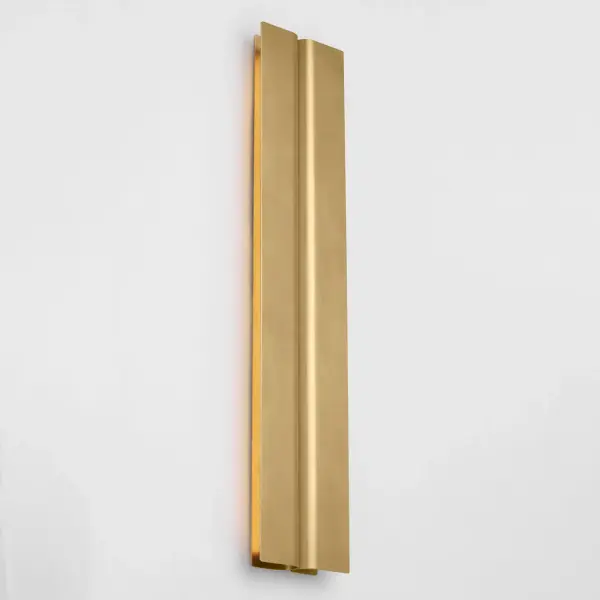 The Cloak 24" Vanity by Peter Bristol transforms bathroom lighting with its architectural folded metal design. Concealed light sources eliminate glare while directing illumination precisely where needed, making it ideal for grooming tasks. - alternate view