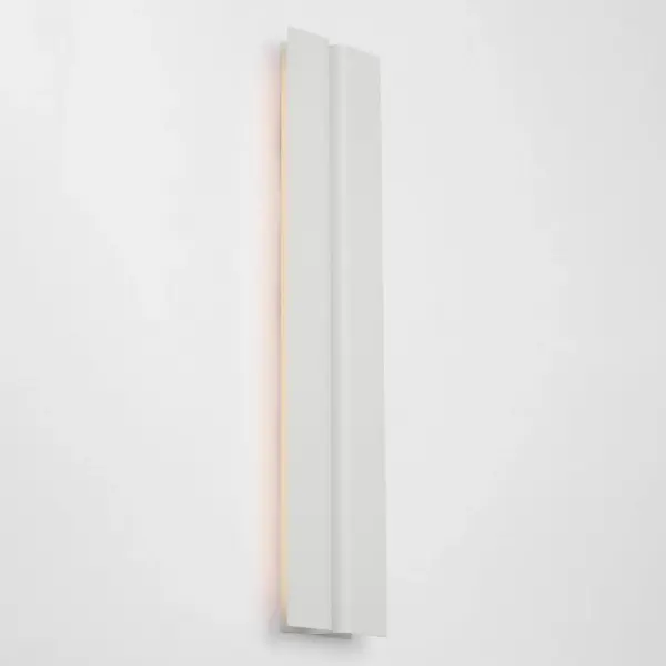 The Cloak 24" Vanity by Peter Bristol transforms functional bathroom lighting into an architectural statement. Folded metal forms conceal the light source for precision illumination without glare, ideal for grooming tasks. - alternate view