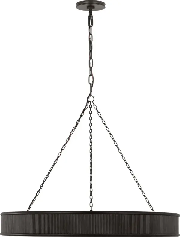 The Ritz 36" Chandelier combines substantial scale with refined aged iron finish, creating a commanding focal point. Its transitional design bridges traditional and contemporary aesthetics, making it versatile for various interiors.
