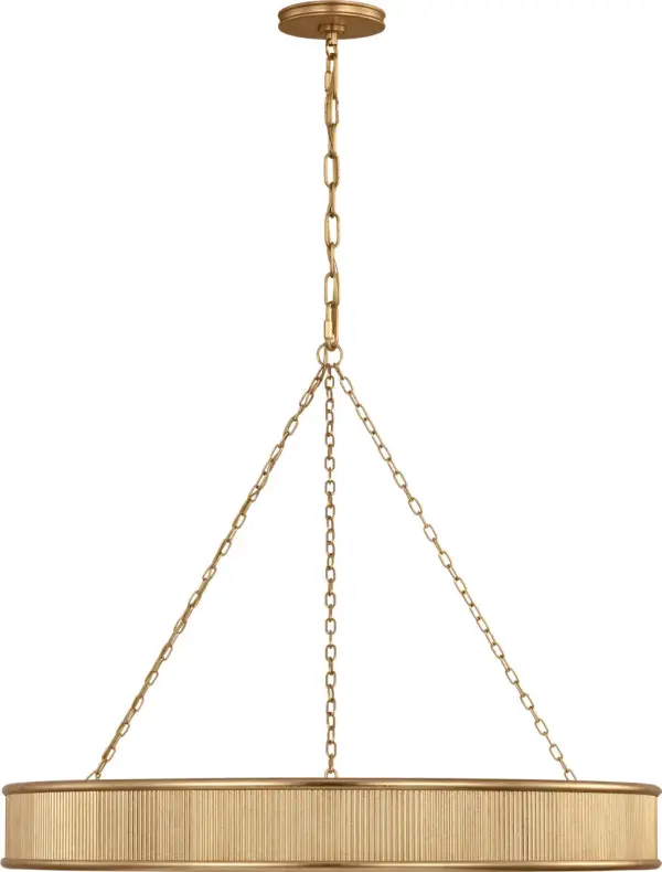 The Ritz 36" Chandelier delivers dramatic presence with its substantial scale and sophisticated Gild finish. Perfect for grand dining rooms and entryways, this fixture combines contemporary design with timeless elegance.