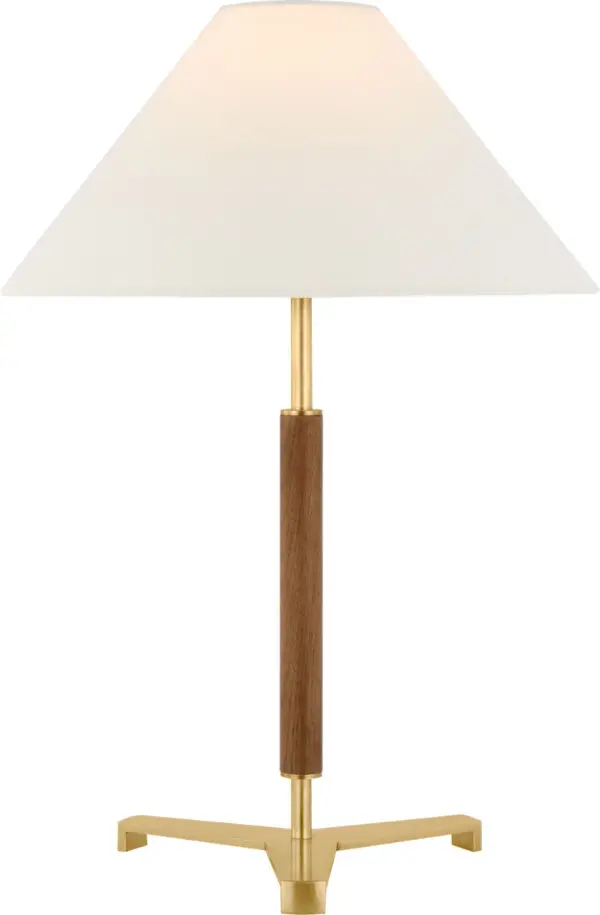 The Amaya table lamp combines antique-burnished brass with rich walnut wood accents, creating a refined transitional piece. At 20" tall with a linen shade, it delivers warm ambient lighting perfect for bedrooms and living spaces.
