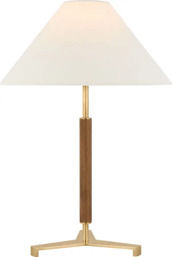 The Amaya table lamp combines antique-burnished brass with rich walnut wood accents, creating a refined transitional piece. At 20" tall with a linen shade, it delivers warm ambient lighting perfect for bedrooms and living spaces. - alternate view