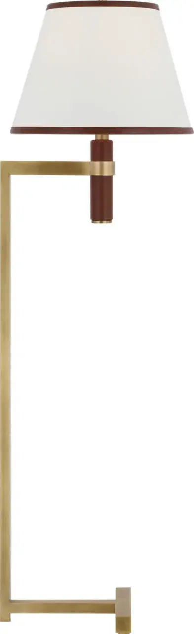 The Hedger floor lamp combines natural brass with saddle leather detailing for a refined, organic aesthetic. At 55" tall, it provides excellent task or ambient lighting while serving as a statement piece in transitional interiors. - alternate view