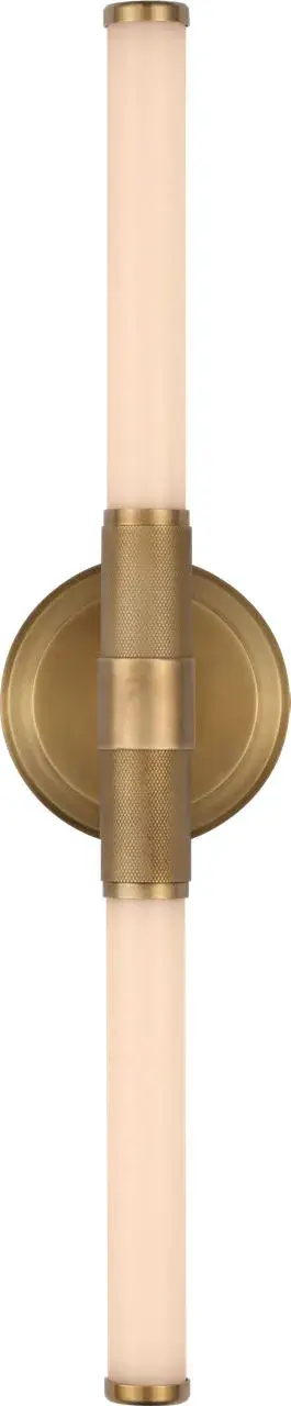 The Barrett 21" bath light combines up and down illumination with a sophisticated natural brass finish and white glass shades. Its transitional design bridges traditional warmth with contemporary clean lines, making it versatile for various bathroom styles.