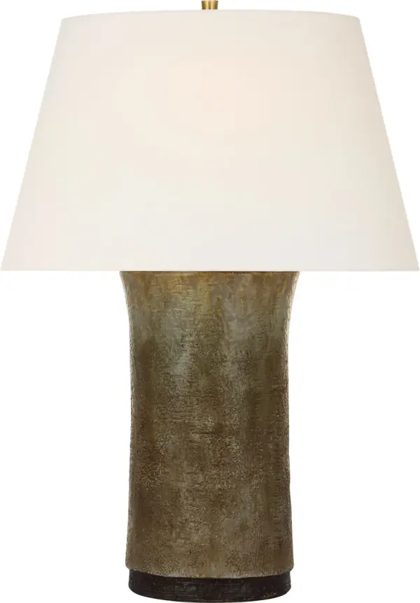 The Damson table lamp combines handcrafted ceramic artistry with transitional design. Its tobacco stoneware finish and natural linen shade create warm, inviting ambiance perfect for residential and hospitality settings. - alternate view