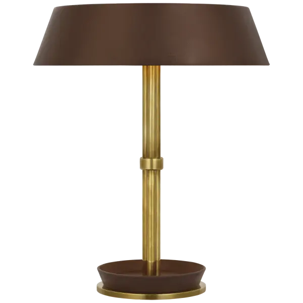 The Hudson St. table lamp combines warm natural brass with rich carob leather detailing for a refined, tactile aesthetic. At 20" tall, it provides substantial presence while maintaining versatility across traditional and contemporary interiors.