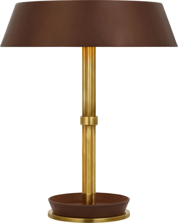 The Hudson St. table lamp combines warm natural brass with rich carob leather detailing for a refined, tactile aesthetic. At 20" tall, it provides substantial presence while maintaining versatility across traditional and contemporary interiors. - alternate view