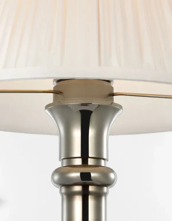 The Thatcher cordless table lamp combines sophisticated Butler's Silver finish with practical wireless functionality. Its 21" height and pleated silk shade deliver refined ambient lighting perfect for modern living. - alternate view