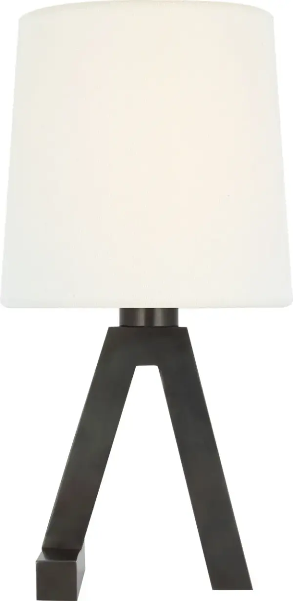 The Hedger accent lamp combines classic bronze metalwork with a soft linen shade, creating warm ambient lighting perfect for intimate spaces. Its compact 11" size makes it ideal for bedside tables and desks.