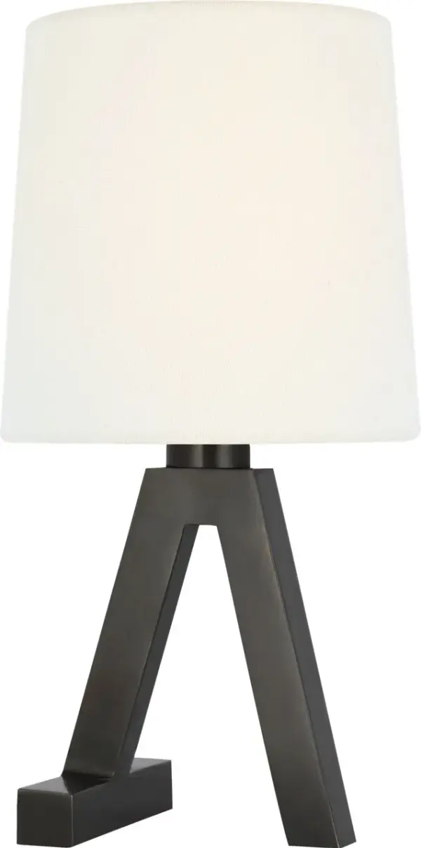 The Hedger accent lamp combines classic bronze metalwork with a soft linen shade, creating warm ambient lighting perfect for intimate spaces. Its compact 11" size makes it ideal for bedside tables and desks. - alternate view
