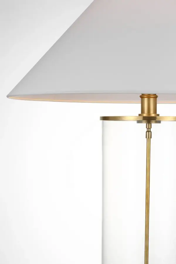 This sophisticated cordless table lamp combines the warmth of natural brass with the convenience of portable lighting. The linen shade provides soft, diffused illumination perfect for any room requiring flexible lighting solutions. - alternate view