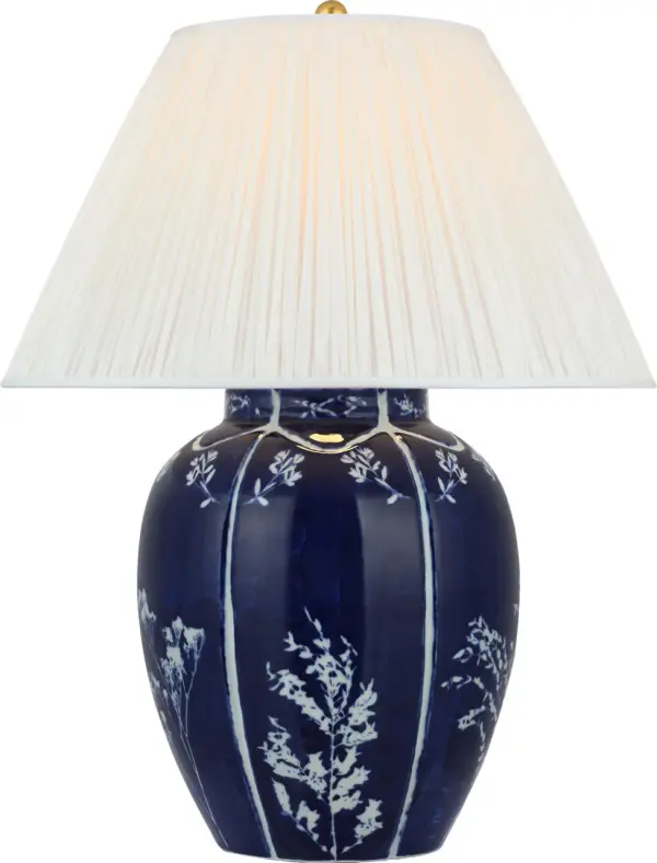 The Halpern table lamp showcases timeless chinoiserie-inspired porcelain in cornflower blue and white, topped with a sophisticated silk pleated shade. At 25" tall, it brings refined elegance to any space.