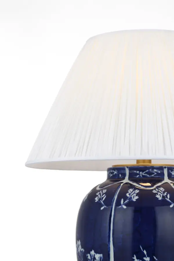 The Halpern table lamp showcases timeless chinoiserie-inspired porcelain in cornflower blue and white, topped with a sophisticated silk pleated shade. At 25" tall, it brings refined elegance to any space. - alternate view
