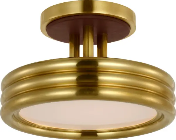 The Hudson St. combines warm natural brass with rich carob leather wrapping for a refined, compact ceiling fixture. Its 8-inch profile delivers upscale style without overwhelming smaller spaces.