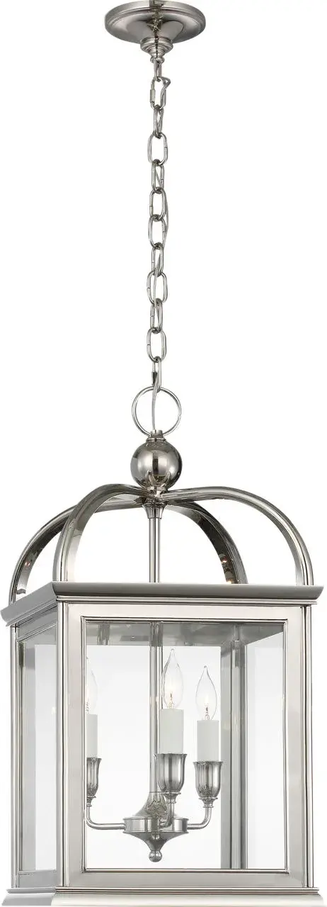 The Rhoades 16" Lantern combines traditional lantern styling with refined polished nickel hardware and clear glass panels. Its substantial 16-inch size makes it ideal for foyers and dining spaces requiring elegant overhead lighting.