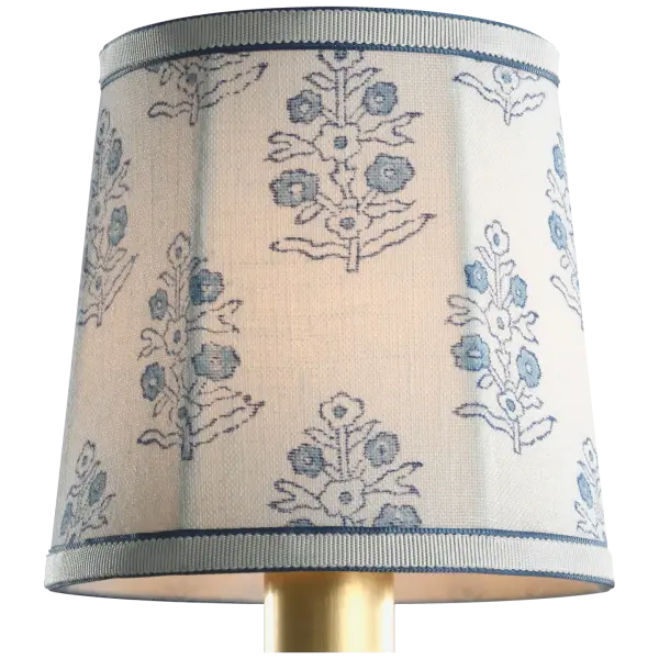 This 5-inch Schumacher empire shade features the sophisticated Blue Aditi pattern, bringing designer fabric styling to table lamps and sconces. The soft empire silhouette offers classic elegance with contemporary pattern appeal.