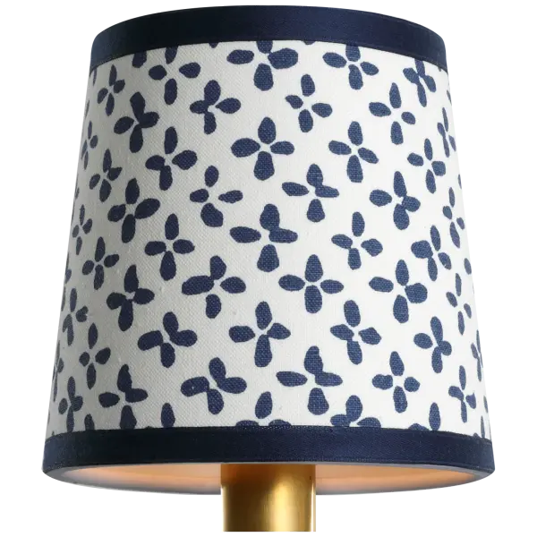 This petite 5-inch empire shade from Schumacher brings refined elegance to any lamp base. The Blue Emerson fabric pattern adds sophisticated visual interest while maintaining versatility across traditional and coastal interiors.