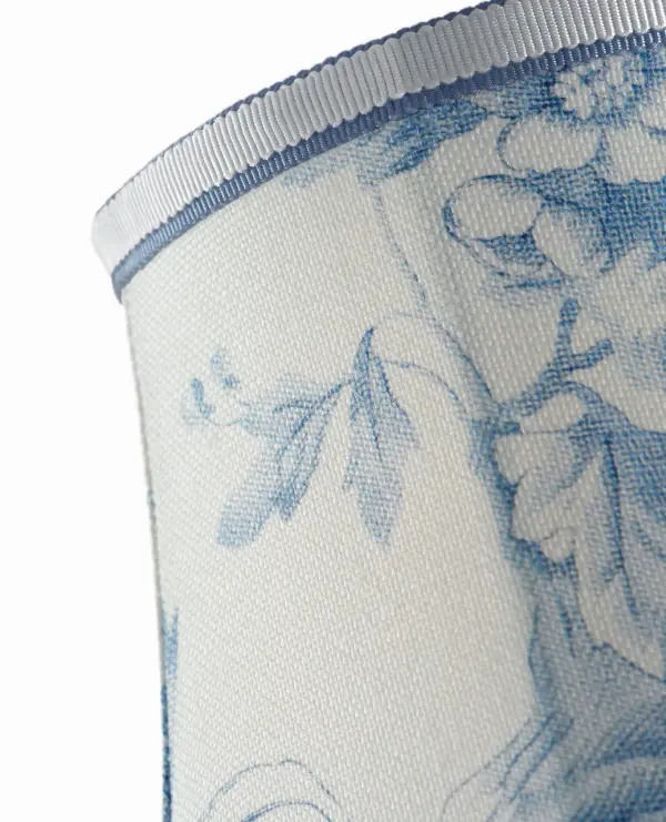 This 6-inch soft empire shade features the timeless Delft toile de fleurs pattern, combining traditional blue and white porcelain-inspired florals with refined fabric construction for versatile table and floor lamp applications. - alternate view