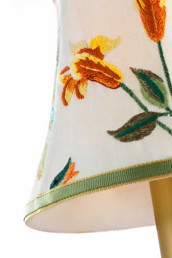 This exquisite 7-inch bell empire shade features royal silk with intricate multi-color embroidery, bringing sophisticated artisanal craftsmanship to any lamp base. The classic silhouette pairs beautifully with traditional and transitional interiors. - alternate view