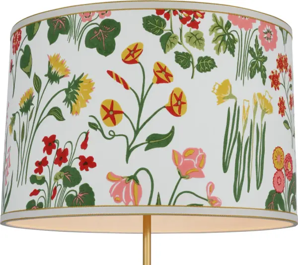 This 18-inch drum shade features Schumacher's signature Carly pattern in soft pink tones, bringing designer sophistication to table lamps and small pendants. The fabric construction diffuses light beautifully while adding decorative appeal.