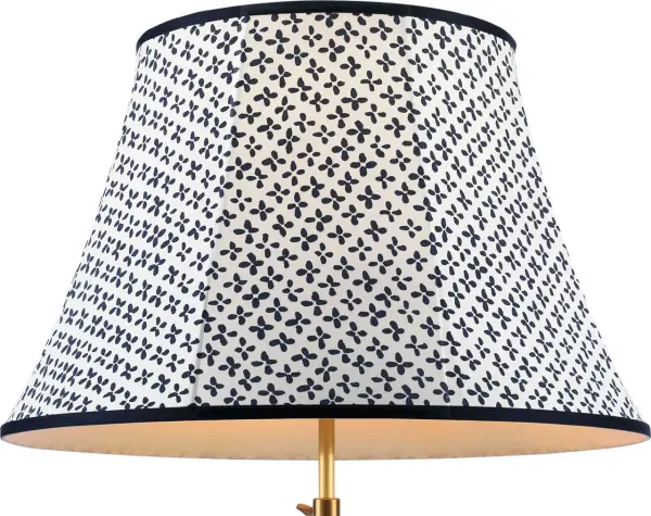 The Schumacher Blue Emerson shade brings sophisticated pattern and color to any lamp base. Its 20-inch diameter makes it ideal for medium to large table lamps, while the soft empire silhouette offers timeless elegance.