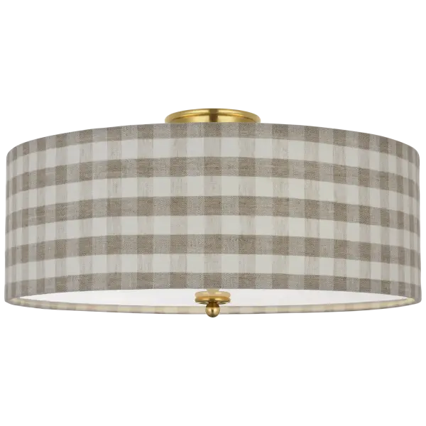 The Cheever flush mount combines traditional brass craftsmanship with a sophisticated check-patterned fabric shade. At 20 inches, it provides ample illumination while maintaining a low profile perfect for standard ceiling heights.
