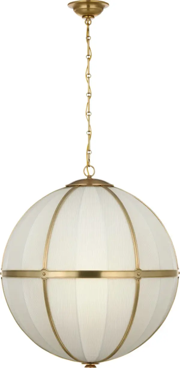 The Allister combines classic globe silhouette with sophisticated Schumacher Blue Charee Stripe fabric, creating a statement piece that bridges traditional and contemporary design. Hand-rubbed antique brass framing adds warmth and luxury.