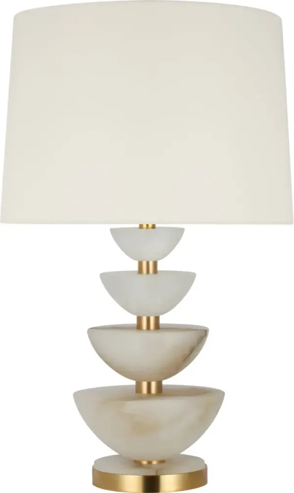 The Aubert table lamp combines natural alabaster stone with hand-rubbed antique brass for a sophisticated look. At 28" tall, it provides substantial presence while the linen shade softens the light beautifully.