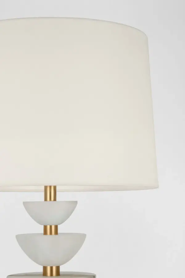 The Aubert table lamp combines natural alabaster stone with hand-rubbed antique brass for a sophisticated look. At 28" tall, it provides substantial presence while the linen shade softens the light beautifully. - alternate view