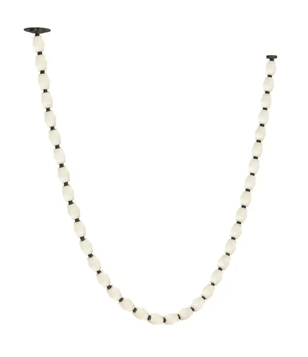 The Collier 108" chandelier makes a dramatic architectural statement with its expansive linear design and natural alabaster diffusers. The warm 2700K lighting creates an inviting ambiance perfect for large dining spaces and grand rooms.