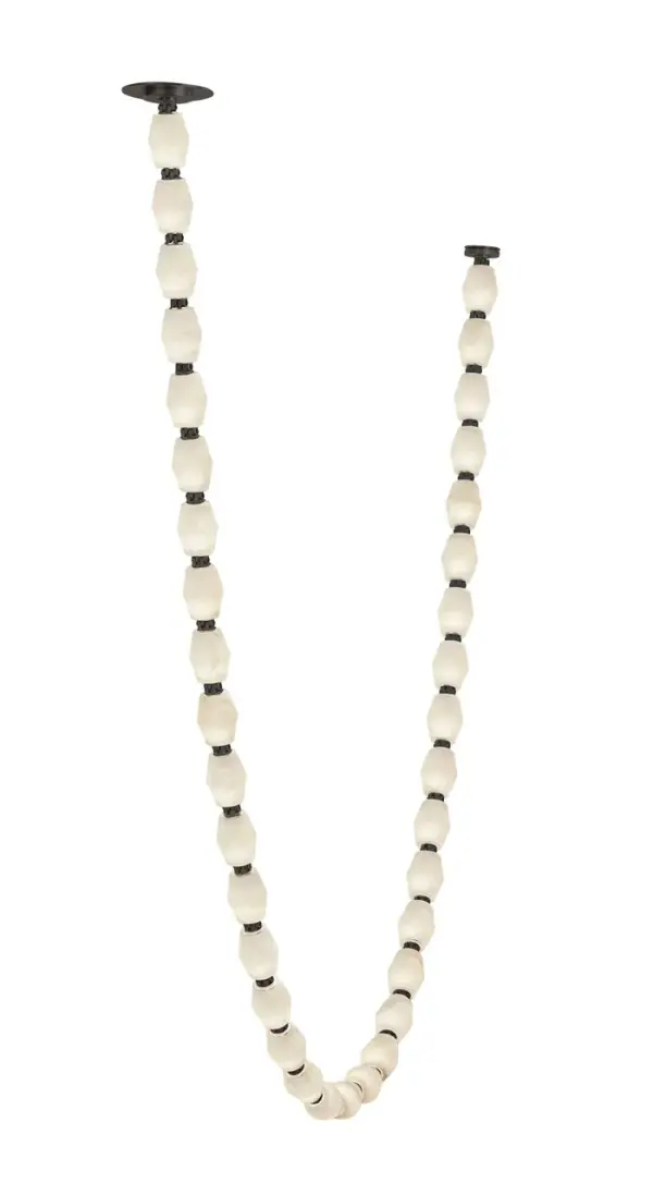 The Collier 108" chandelier makes a dramatic architectural statement with its expansive linear design and natural alabaster diffusers. The warm 2700K lighting creates an inviting ambiance perfect for large dining spaces and grand rooms. - alternate view