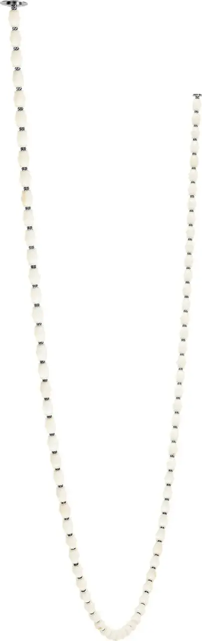 The Collier Alabaster 240 Chandelier makes a dramatic architectural statement with its expansive linear design and natural alabaster diffusers. The polished nickel finish adds refined elegance while the 2700K LED provides warm, inviting illumination.