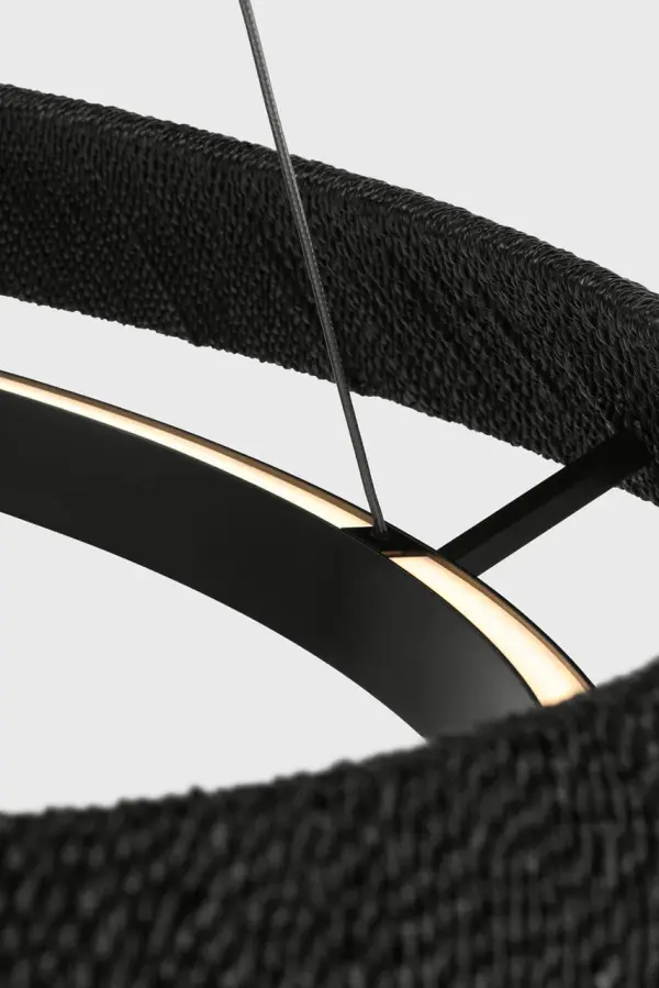 The Noa Medium Chandelier combines contemporary design with a distinctive washed black bronze finish. Featuring integrated 2700K LED lighting with 90 CRI for exceptional color rendering, this fixture delivers both style and performance. - alternate view