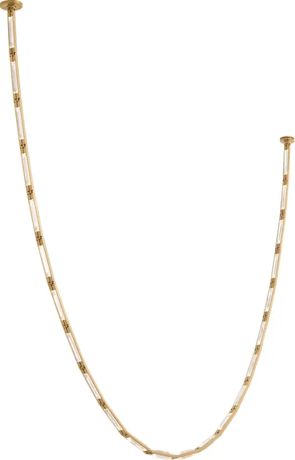 The Catena 118" chandelier is an architectural masterpiece designed for expansive spaces. Its hand-rubbed antique brass finish and impressive 10-foot length create a stunning focal point over large dining tables or kitchen islands.