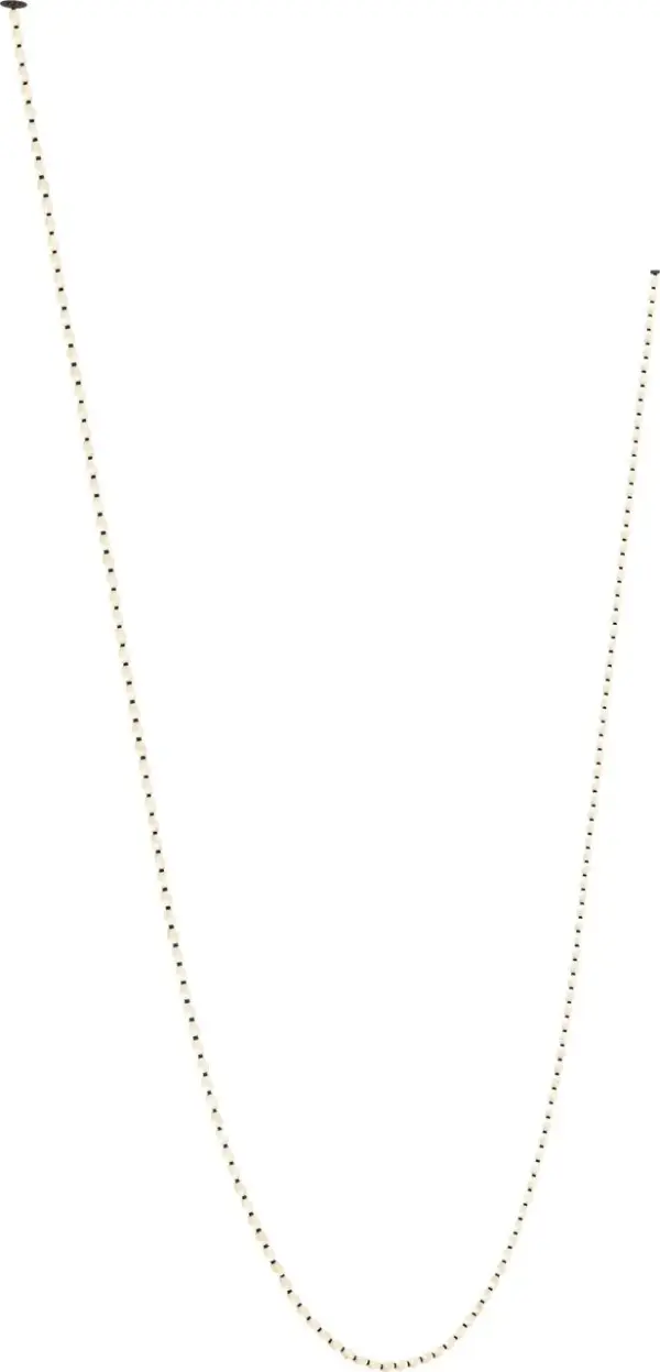 The Collier chandelier combines solid faceted alabaster glass with brass connectors to create a stunning light sculpture. Integrated LED modules with 2700K warm light provide sophisticated illumination with remote control convenience.