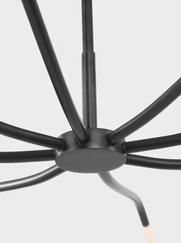 The Lajos 50" Chandelier combines disciplined minimalism with innovative fiber optic technology. Elongated arms support etched crystal cylinders that diffuse light evenly, creating a refined statement piece for dining and living spaces. - alternate view