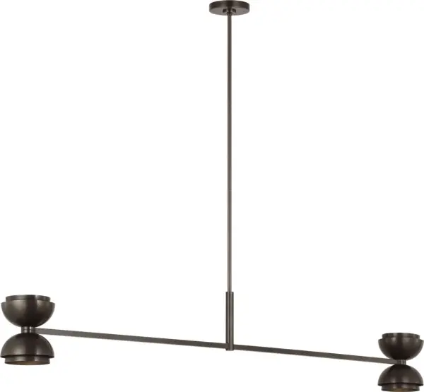 The Shanti X-Large Linear Chandelier delivers dramatic scale and refined contemporary style in a dark bronze finish. With integrated 2700K LED and 90 CRI, it provides warm, color-accurate lighting perfect for dining and entertaining spaces.