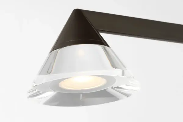 The Midrand transforms industrial geometry into sophisticated lighting art. Its 60-inch linear design features conical metal forms paired with crystal diffusers, delivering commanding yet refined illumination perfect for modern dining spaces and commercial settings. - alternate view